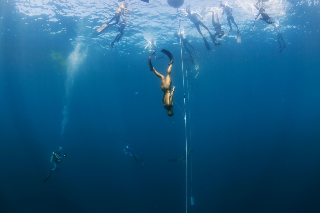 Alexey Molchanov begins his freedive at the Big Blue Freediving competition on November 3, 2015 off the coast of La Paz, Mexico. The 3-time World Champion and 4-times World Record Holder accomplished the deepest ever bi-fin dive with a trip to 105 meters deep and back on one breath. Photo by Logan Mock-Bunting ONE-TIME USE ONLY. NOT FOR ARCHIVE. NOT FOR REDISTRIBUTION