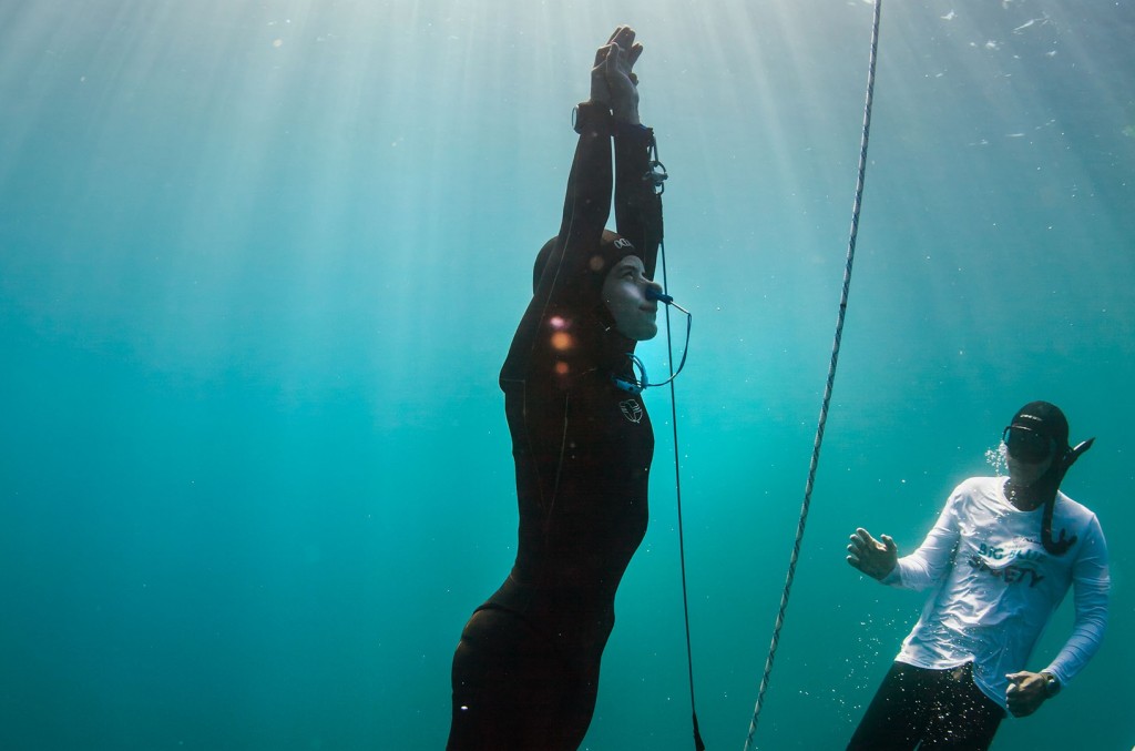 Sofia Gomez Uribe surfaces from a successful 75 meter freedive in Constant Weight with Fins at the Big Blue Freediving competition on November 3, 2015 off the coast of La Paz, Mexico. The freedive down and back was made on breath-hold, and set both a National Record and Continental Record. Gomez Uribe is a 13-time national record holder for Mexico. Photo by Logan Mock-Bunting ONE-TIME USE ONLY. NOT FOR ARCHIVE. NOT FOR REDISTRIBUTION